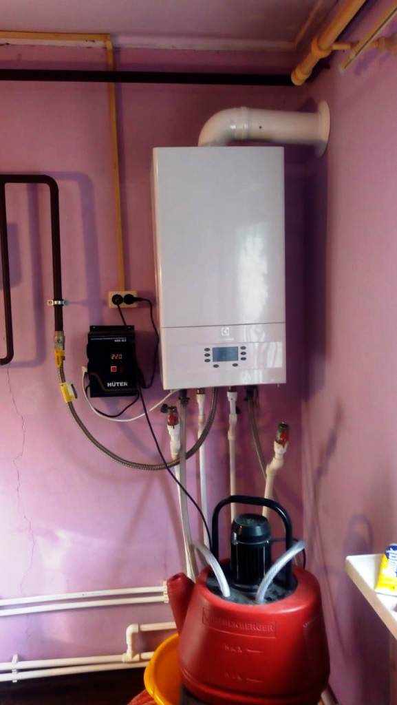 Промывка теплообменника настенного котла и системы отопления в частном доме